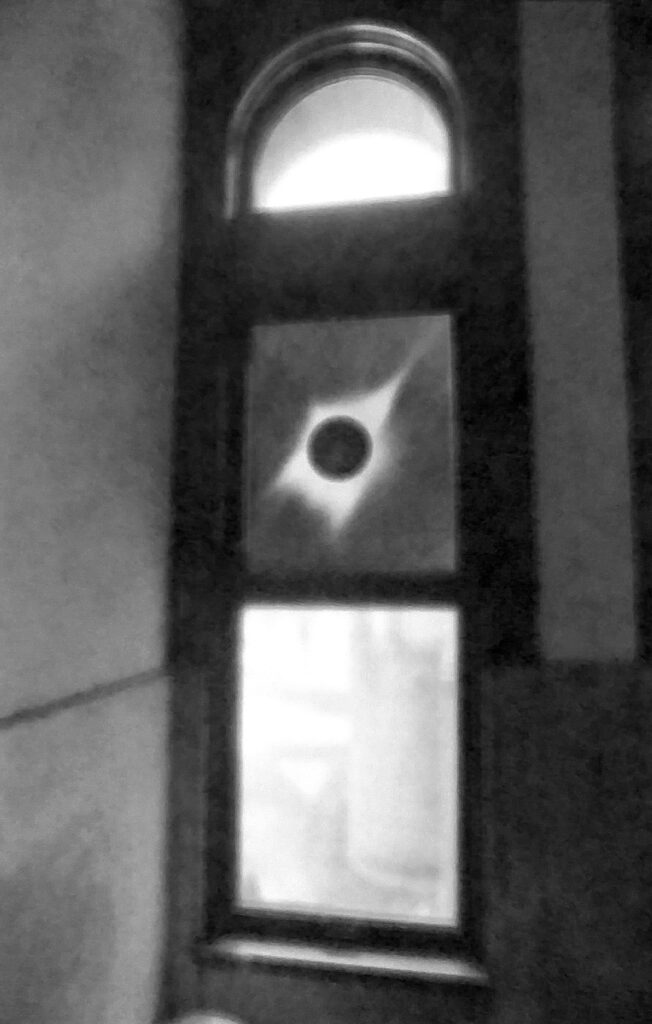 A negative of an eclipse adorns a window in the Yerkes Observatory. Dan Plutchak photo.
