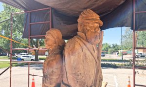 Wood carver bringing Civil War Muster Tree back to life